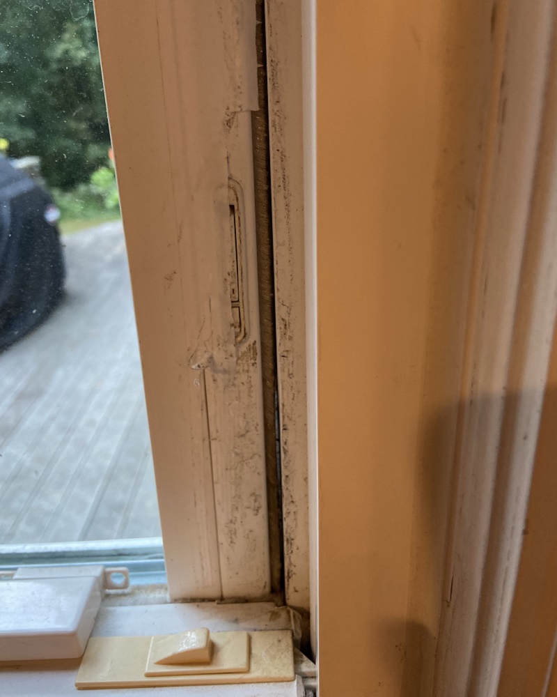 Old windows which were taped to stop the drafts 